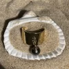 Bague dorée perle de Tahiti dans coquillage avec sable
