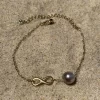 Bracelet infinity doré avec perle de tahiti