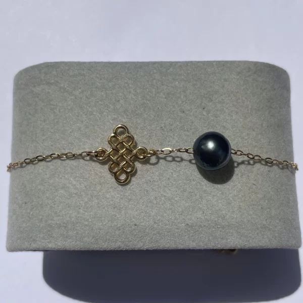 Bracelet pendentif chinois et perle de tahiti sur écrin