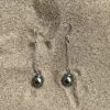 Boucles d'oreilles uniques en acier inoxydable avec perles de Tahiti, faites à la main