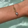 Bracelet doré infinity et perle de Tahiti