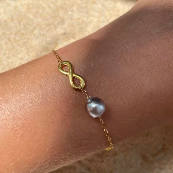 Bracelet perle de Tahiti et pendentif infinity