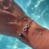 Bracelet Infinity avec perle du Pacifique