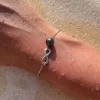 Bracelet Infinity argenté orné d'une perle Polynésienne