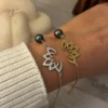bracelets lotus acier inoxydable et perle de tahiti